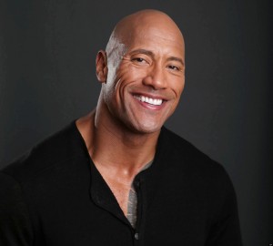 In this Saturday, March 23, 2013 photo, Dwayne Johnson poses for a portrait at the Four Seasons in Los Angeles. The 40-year-old actor has become a savior of stale film series, injecting new life into Fast Five, The Mummy Returns, Journey 2: The Mysterious Island and now G.I. Joe: Retaliation. The former professional wrestler rocks bourgeoning and established franchises by joining them on the second or subsequent installment and boosting the property's box office. (Photo by Eric Charbonneau/Invision/AP)